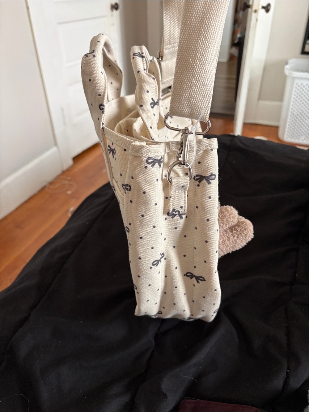 Madden girl. Cream Bow-Print Canvas Tote Bag with Bear Charm. - Picture 8 of 15